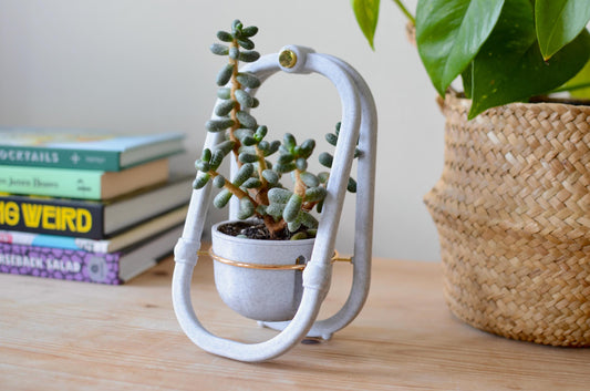 Cradle planter - Mini, modern indoor plant pot in marble plastic/brass